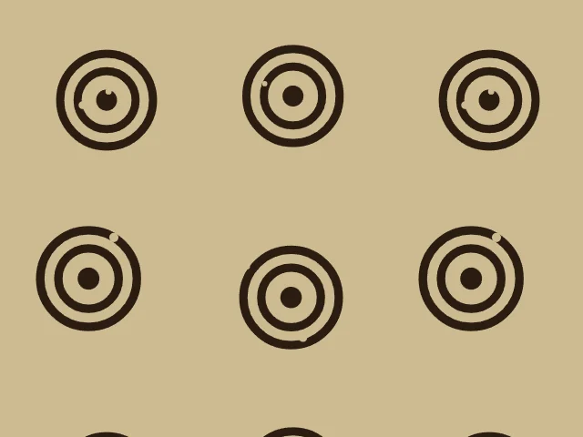 Large dark concentric rings with centers on a tan ground
