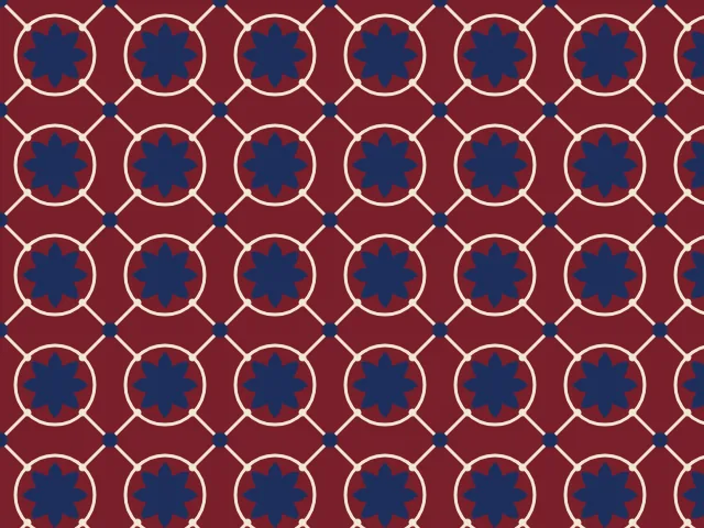 Navy eight-pointed rosettes inside cream rings on a maroon ground, linked by diagonal cream lines with navy dots at the crossings