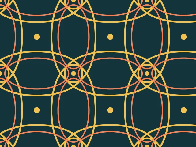 Coral ellipses with navy inner layers and dots on a cream ground