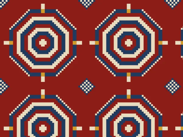 Octagonal medallions of cream and navy rings with gold hooks on a red ground
