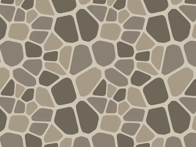 Irregular rounded stones in three shades of gray-brown separated by pale mortar