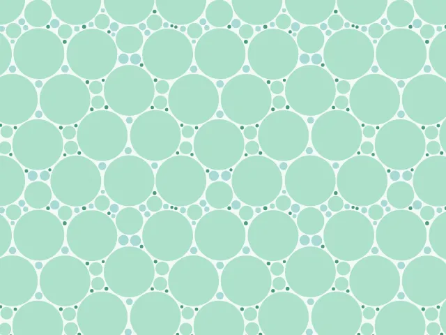 Light mint discs of many sizes that touch each other on a pale background