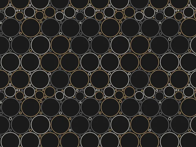 Thin gold and grey circle outlines of many sizes on a dark background
