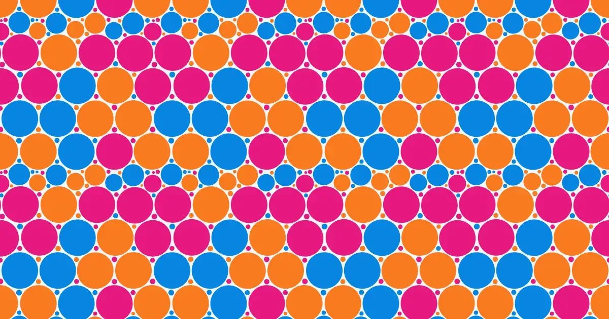 Densely packed discs of many sizes in pink, orange, blue and green
