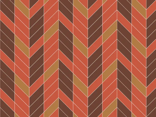 Rust, brown and ochre planks meeting in a V-shaped chevron