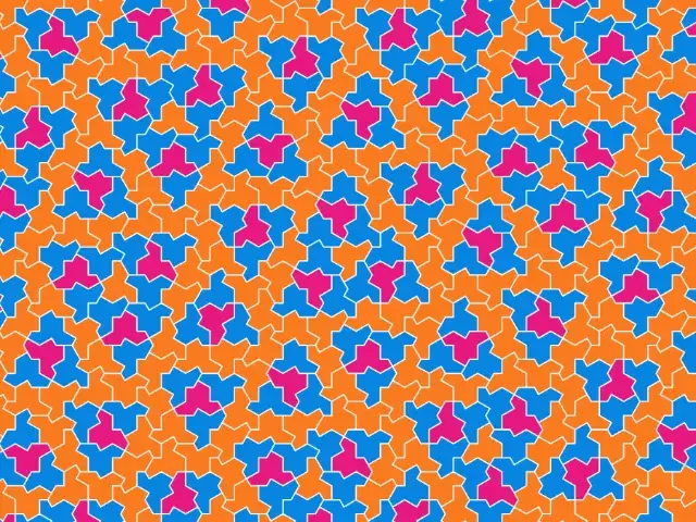 Hat-shaped tiles in orange, blue and pink forming a non-repeating pattern