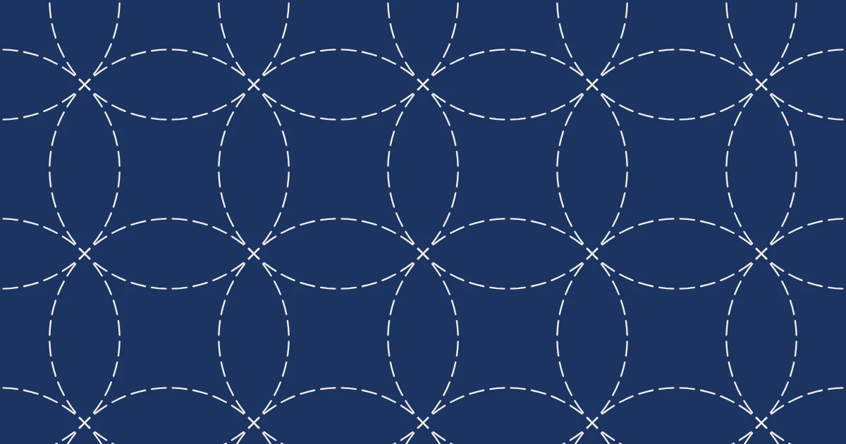 White dashed circles overlapping in a seven-treasures pattern on indigo blue cloth