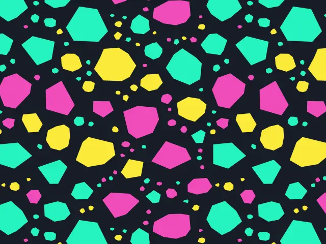 Chips of turquoise, pink and yellow stone on a near-black ground