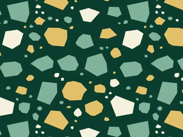 Chips of sage green, ochre and cream on a deep green ground