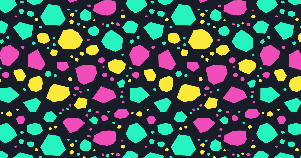 Chips of turquoise, pink and yellow stone on a dark ground