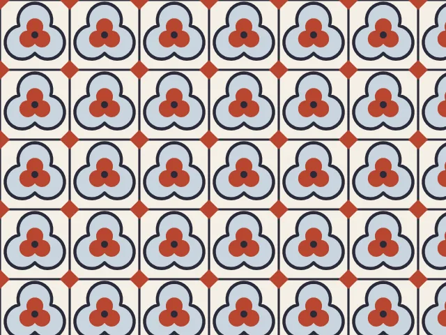 Pale blue trefoils with red lobes outlined in dark navy, inside square cells on a cream ground with red diamonds at the corners