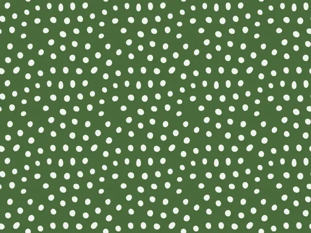White dots of even size scattered over a green background