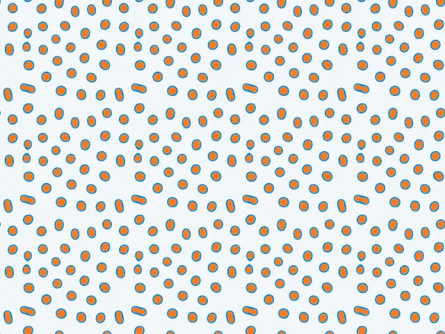 Small orange dots inside pale blue cells on a light background