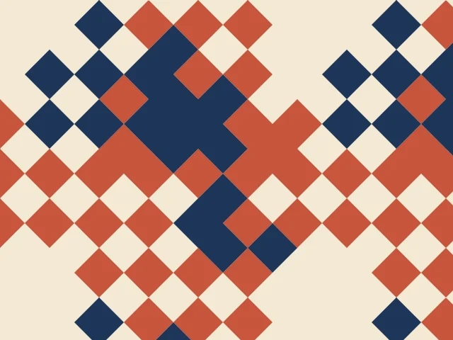 Red and navy diamonds scattered on a cream ground in a Wang tile mosaic